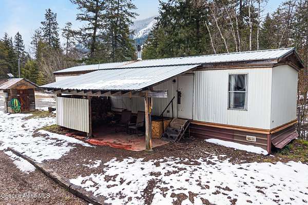 5.32 Acres of Land with Home for Sale in Clark Fork, Idaho