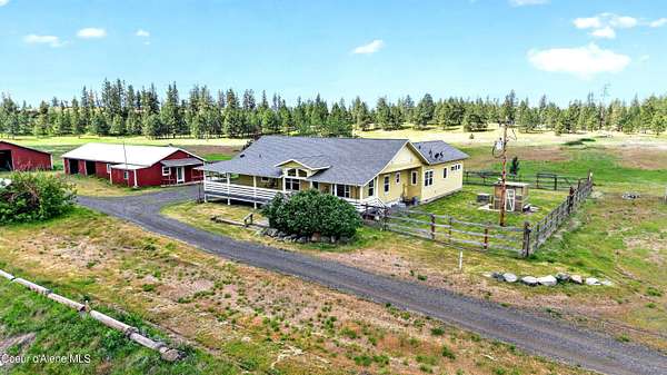 84 Acres of Recreational Land with Home for Sale in Nine Mile Falls, Washington