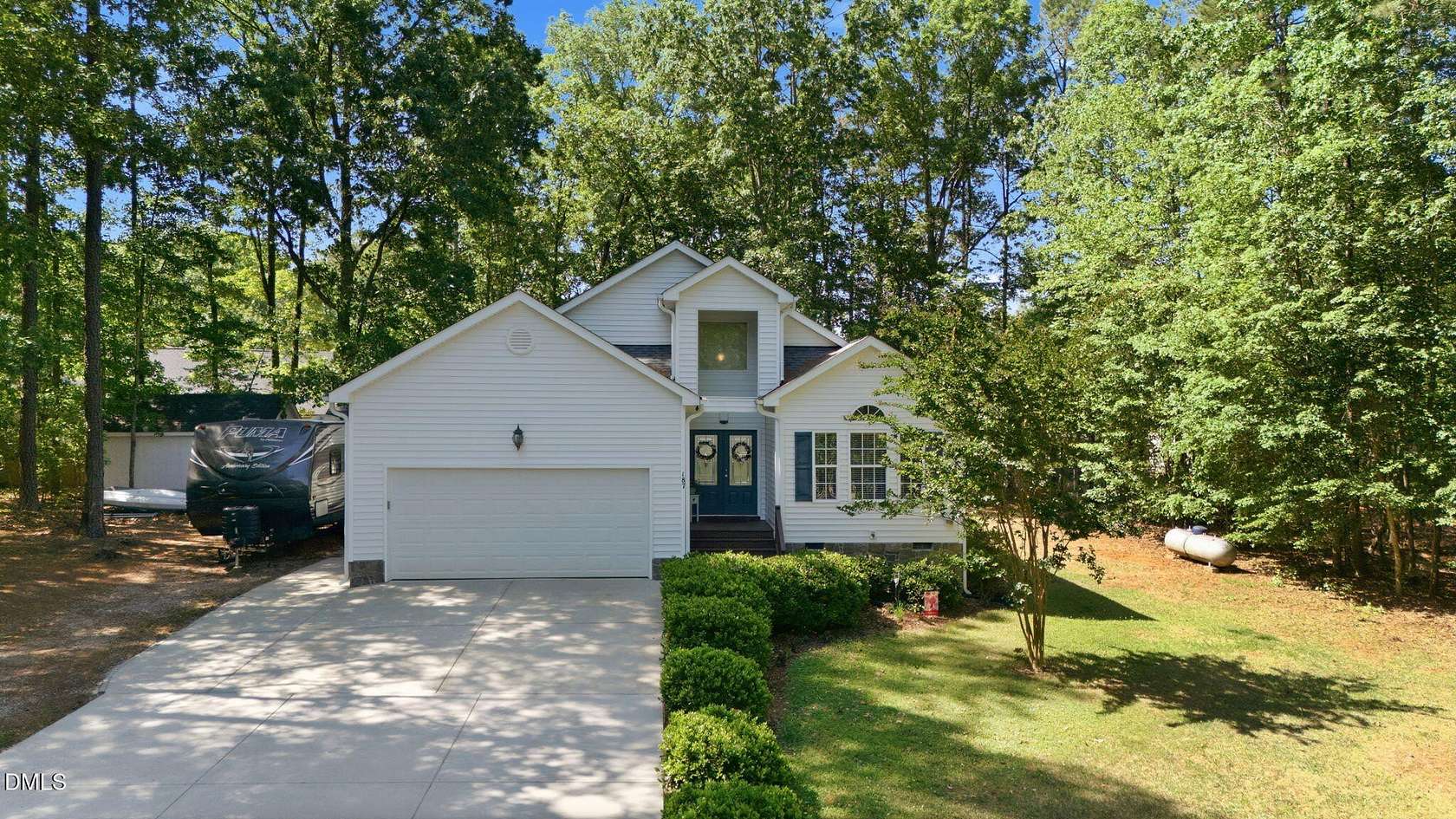 1.5 Acres of Land with Home for Sale in Louisburg, North Carolina