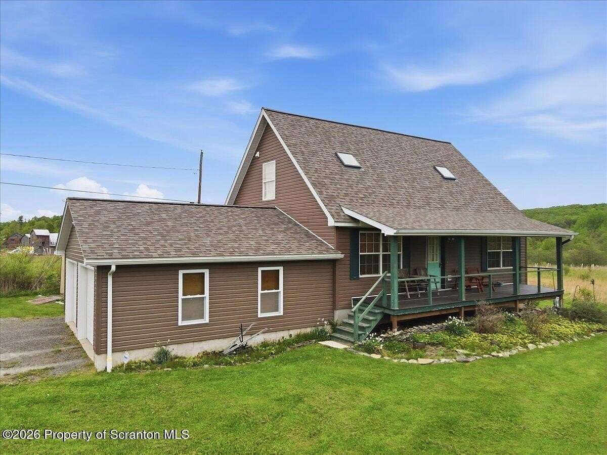 4 Acres of Land with Home for Sale in Thompson, Pennsylvania