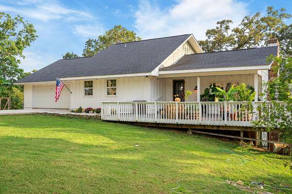 15.4 Acres of Land with Home for Sale in Kirbyville, Missouri