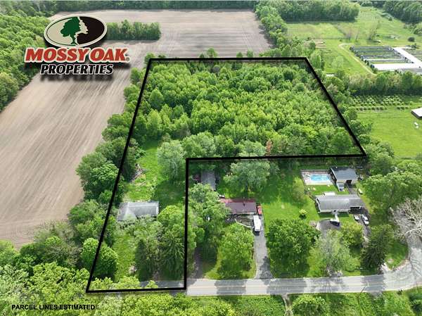 6 Acres of Land with Home for Auction in Three Oaks, Michigan