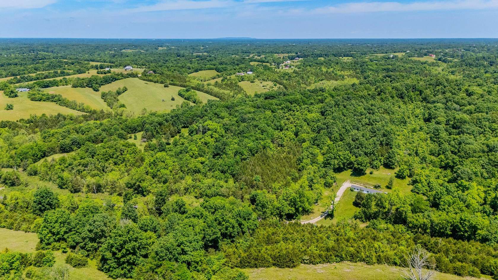 48 Acres of Land with Home for Sale in Lawrenceburg, Kentucky