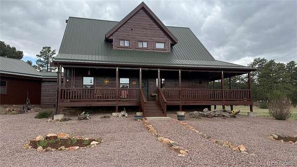 34.3 Acres of Recreational Land with Home for Sale in Cotopaxi, Colorado