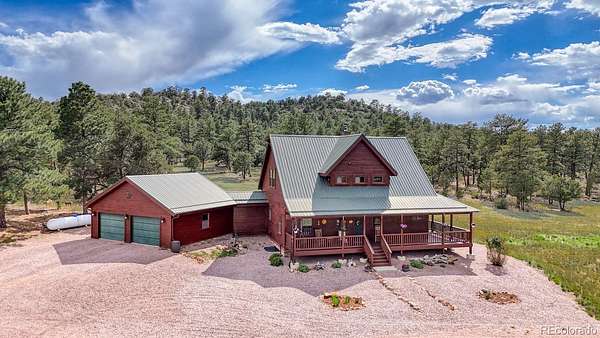 34.3 Acres of Recreational Land with Home for Sale in Cotopaxi, Colorado