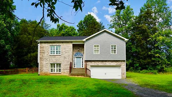 2 Acres of Land with Home for Sale in Pleasant View, Tennessee