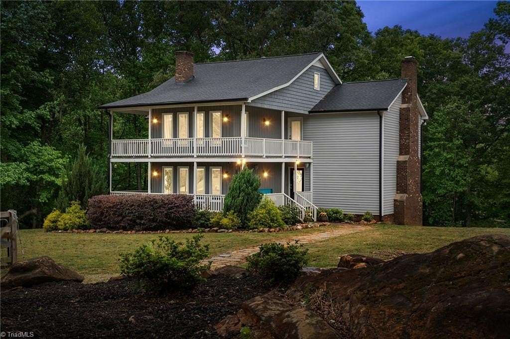 6.77 Acres of Land with Home for Sale in Pleasant Garden, North Carolina