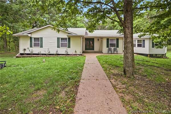 5.75 Acres of Land with Home for Sale in Eldon, Missouri