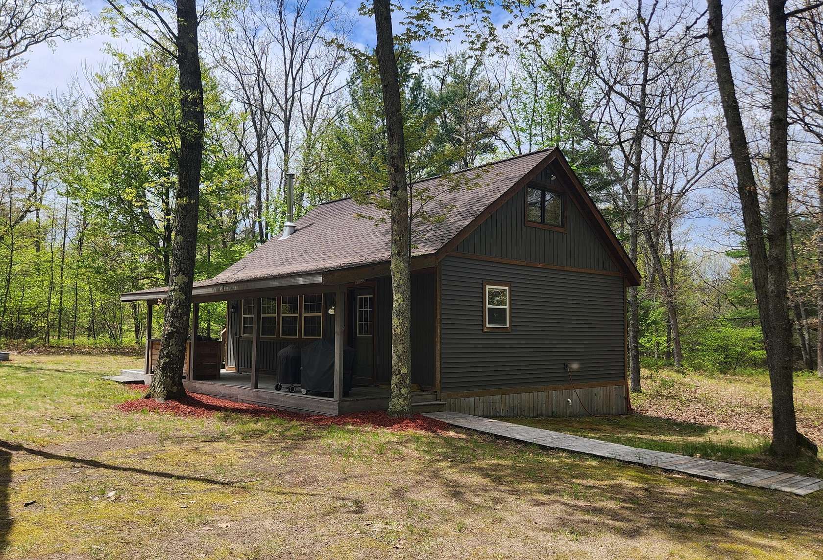 20 Acres of Recreational Land with Home for Sale in Chase, Michigan