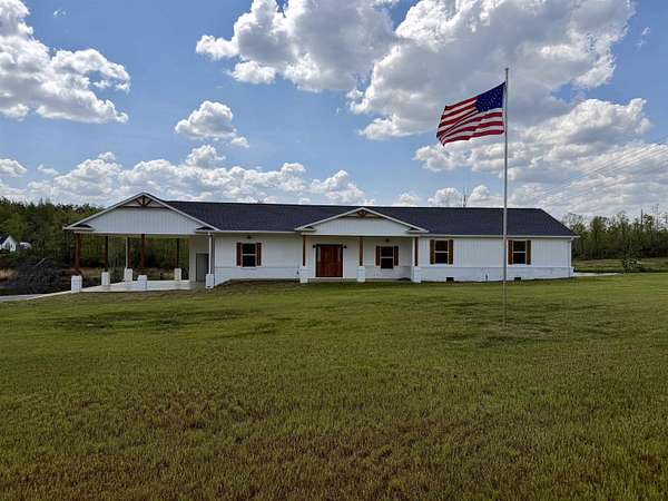 1.84 Acres of Land with Home for Sale in Selmer, Tennessee