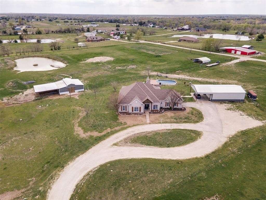 11.2 Acres of Land with Home for Sale in Caddo Mills, Texas
