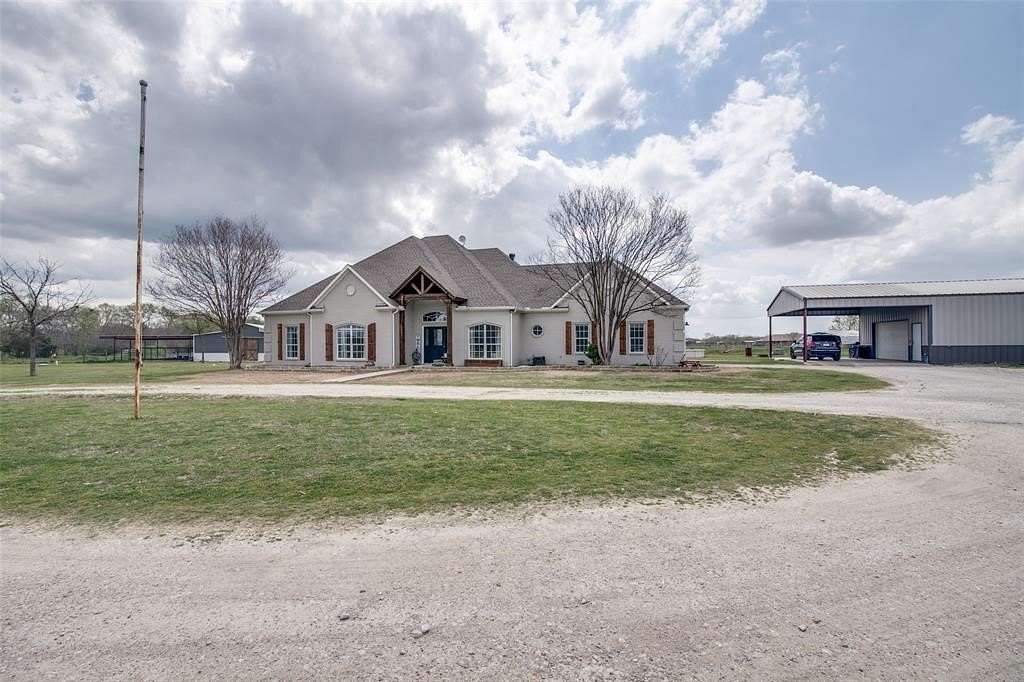11.2 Acres of Land with Home for Sale in Caddo Mills, Texas