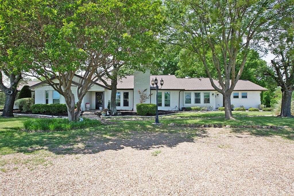 3 Acres of Land with Home for Sale in Sachse, Texas