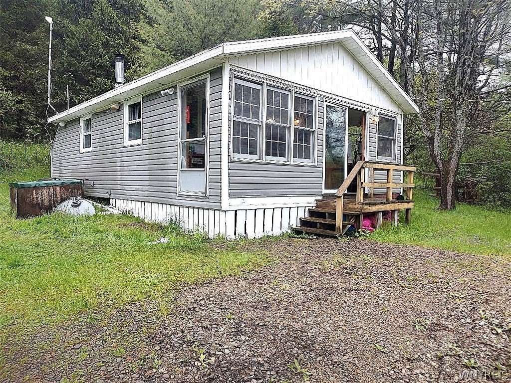 11.8 Acres of Recreational Land with Home for Sale in Great Valley, New York