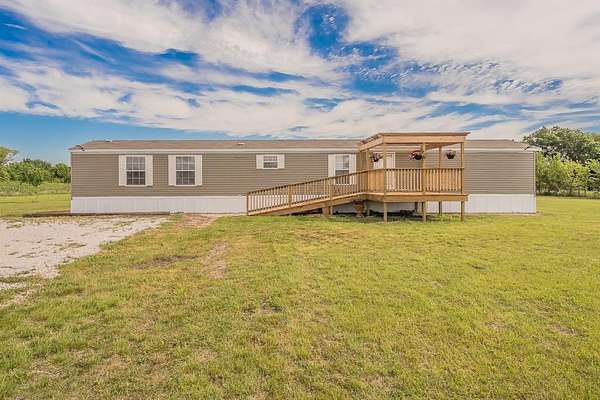 5 Acres of Land with Home for Sale in Justin, Texas