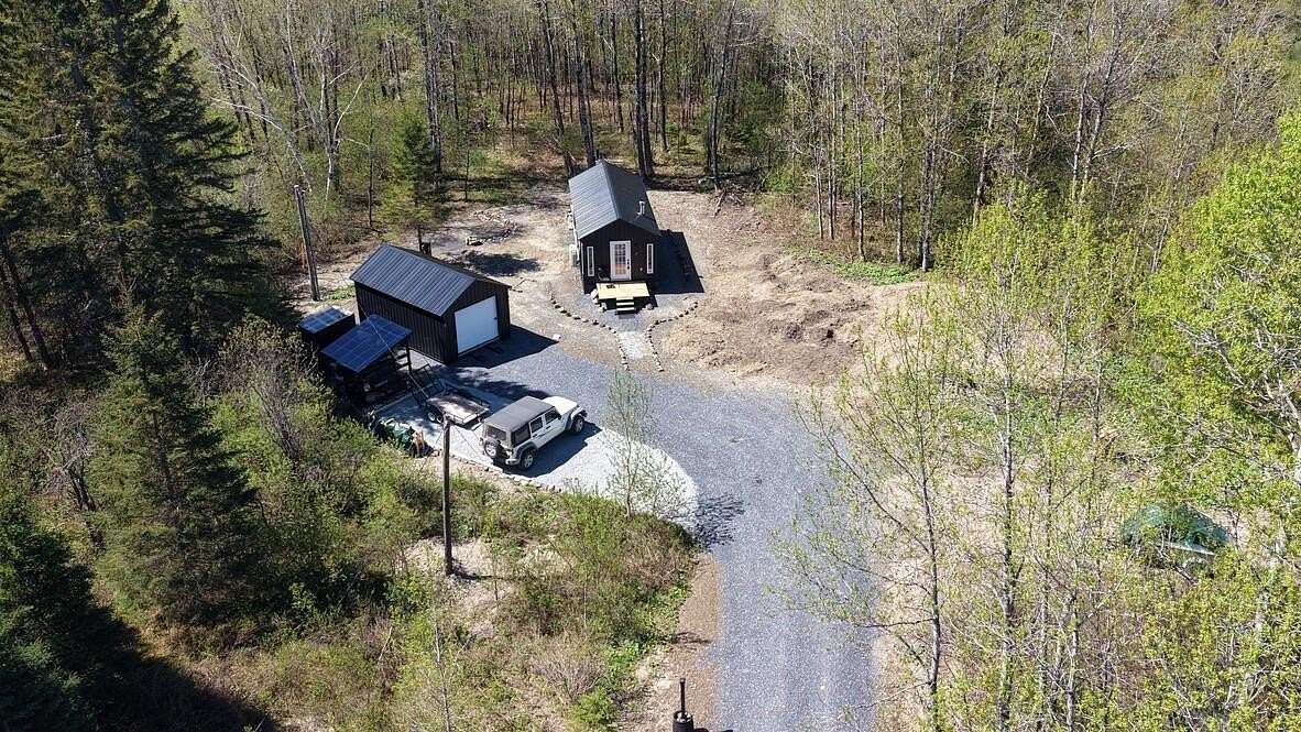 59.4 Acres of Recreational Land with Home for Sale in Woodland Town, Maine