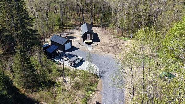59.4 Acres of Recreational Land with Home for Sale in Woodland Town, Maine