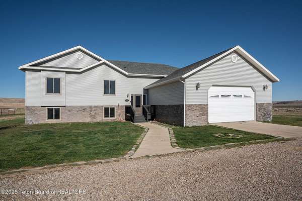 9.9 Acres of Land with Home for Sale in Marbleton, Wyoming