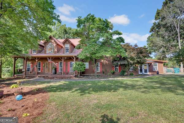 7.74 Acres of Land with Home for Sale in Shady Dale, Georgia