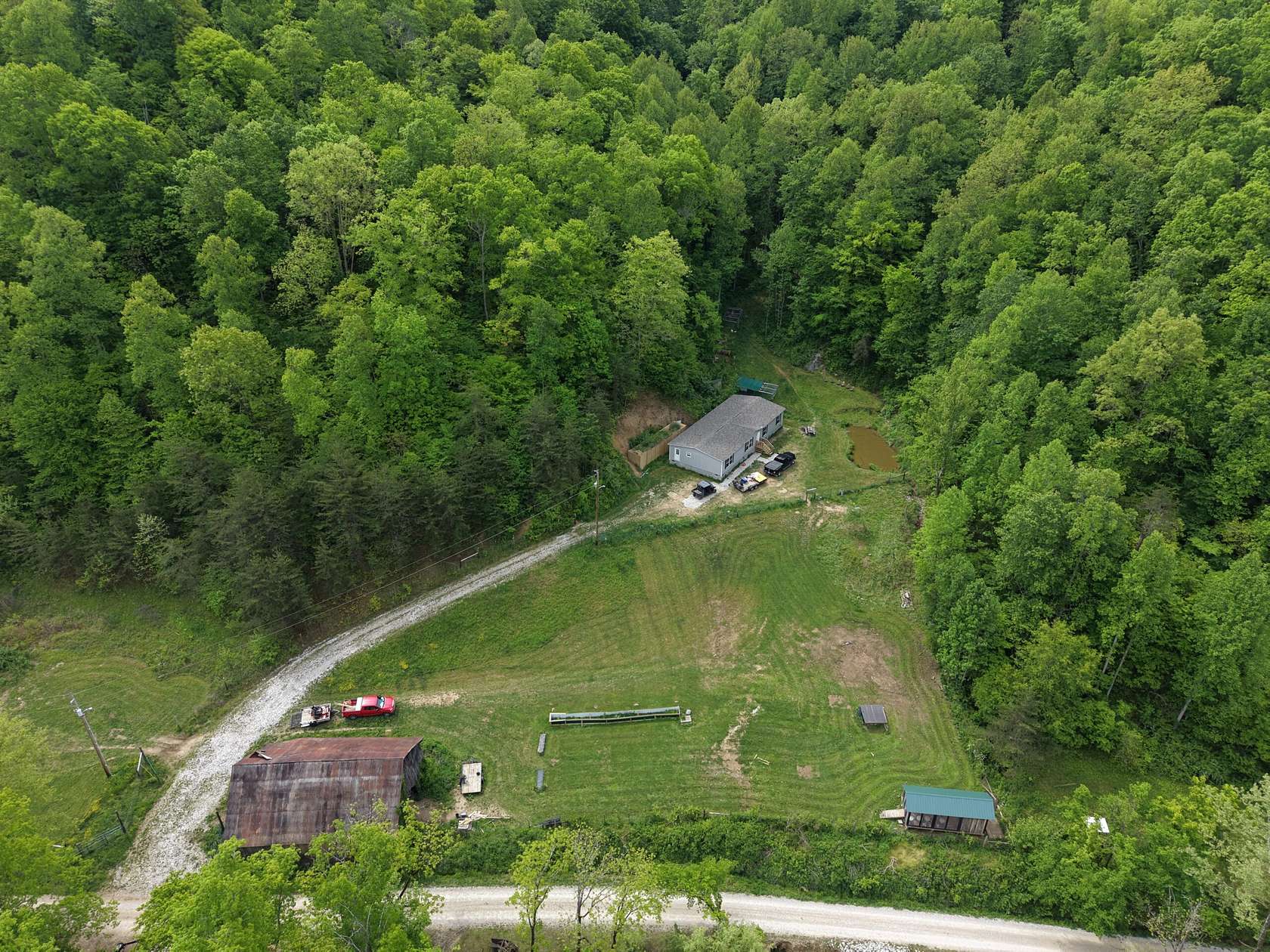 92 Acres of Land with Home for Sale in Booneville, Kentucky