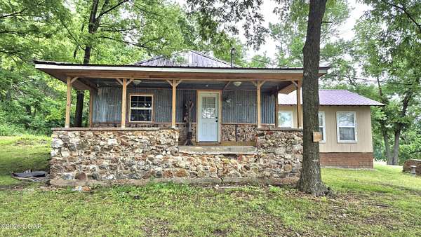 5.15 Acres of Land with Home for Sale in Wyandotte, Oklahoma