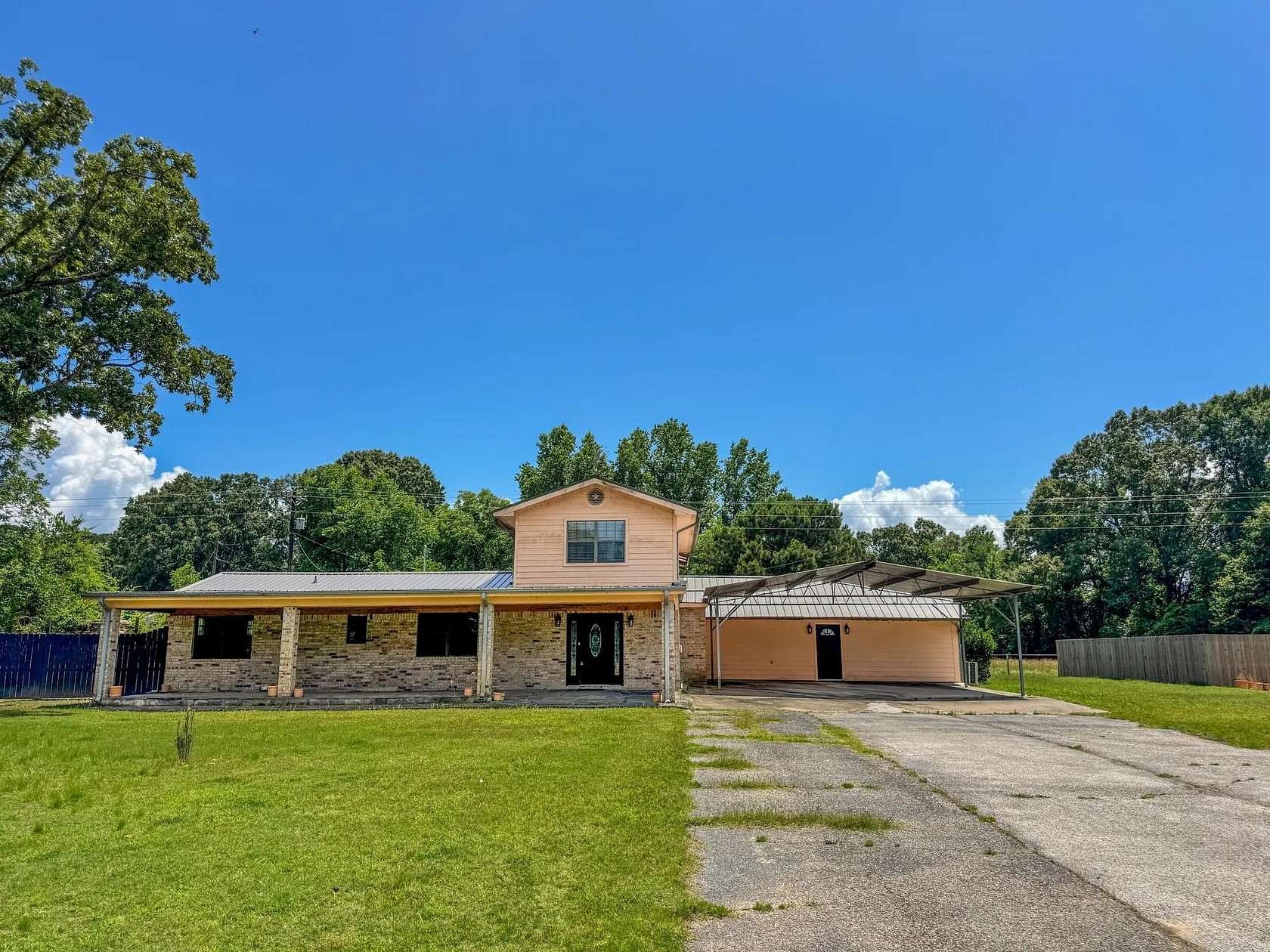 3.49 Acres of Land with Home for Sale in Avinger, Texas