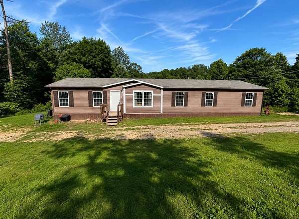 5.86 Acres of Land with Home for Sale in Fort Gay, West Virginia