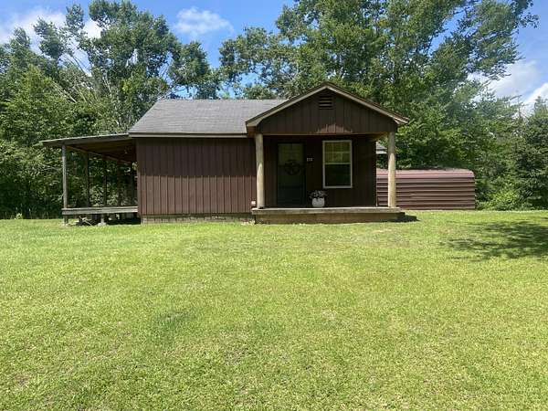 1.5 Acres of Land with Home for Sale in Burnsville, Mississippi