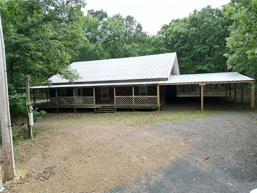 6.3 Acres of Land with Home for Sale in Belleville, Arkansas