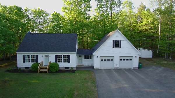 1.5 Acres of Land with Home for Sale in Sangerville, Maine
