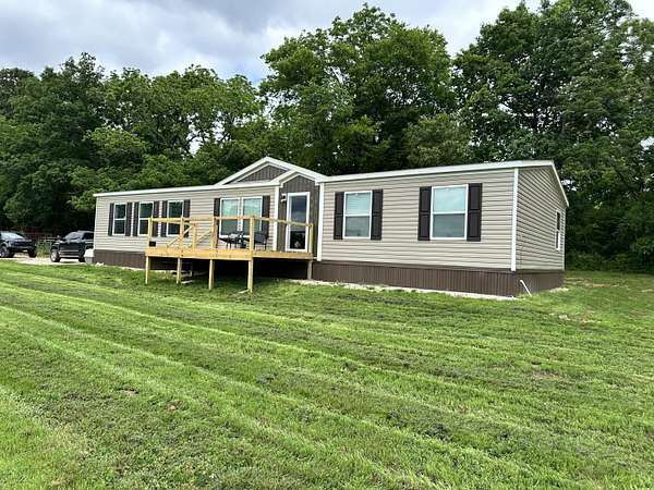 90 Acres of Land with Home for Sale in Mammoth Spring, Arkansas
