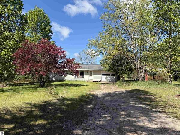 1.83 Acres of Land with Home for Sale in Lake Ann, Michigan