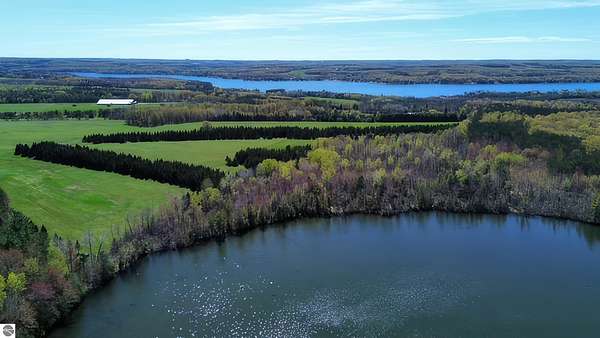 180 Acres of Land with Home for Sale in East Jordan, Michigan