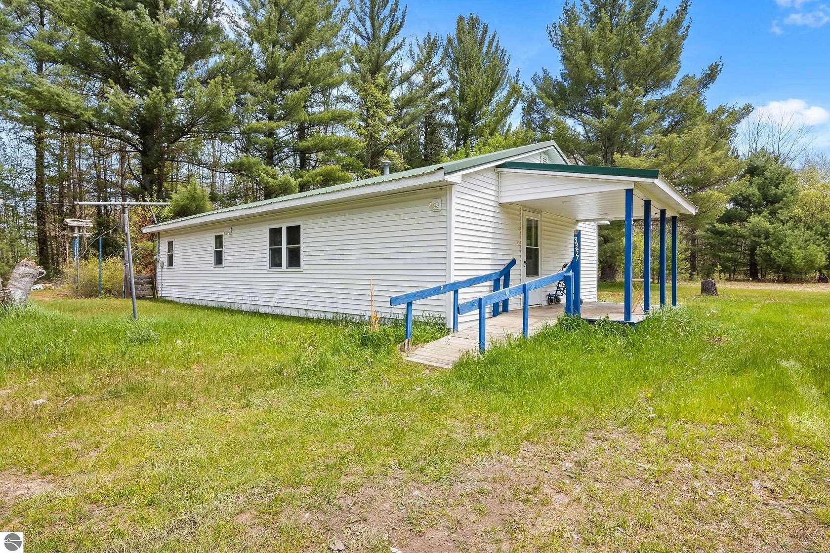 5 Acres of Land with Home for Sale in South Boardman, Michigan
