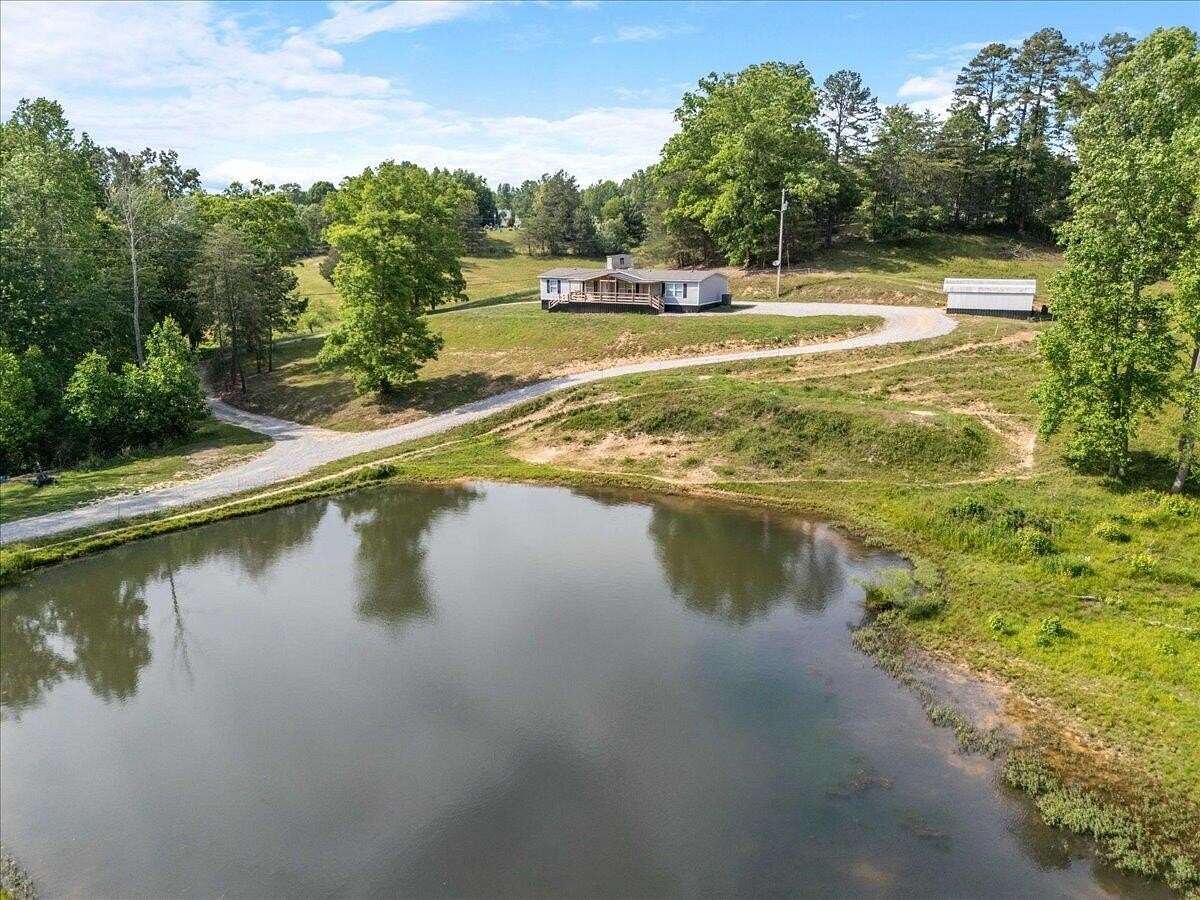 10.6 Acres of Land with Home for Sale in Keavy, Kentucky