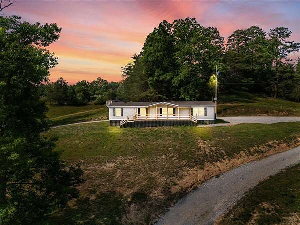 10.6 Acres of Land with Home for Sale in Keavy, Kentucky