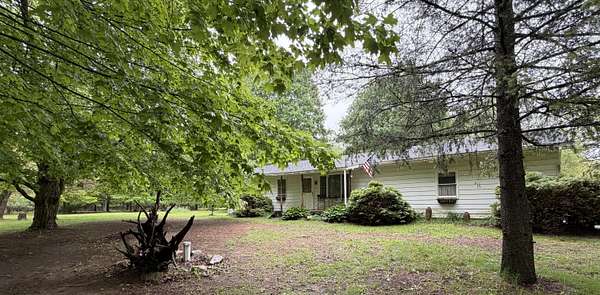 9 Acres of Land with Home for Sale in Belding, Michigan