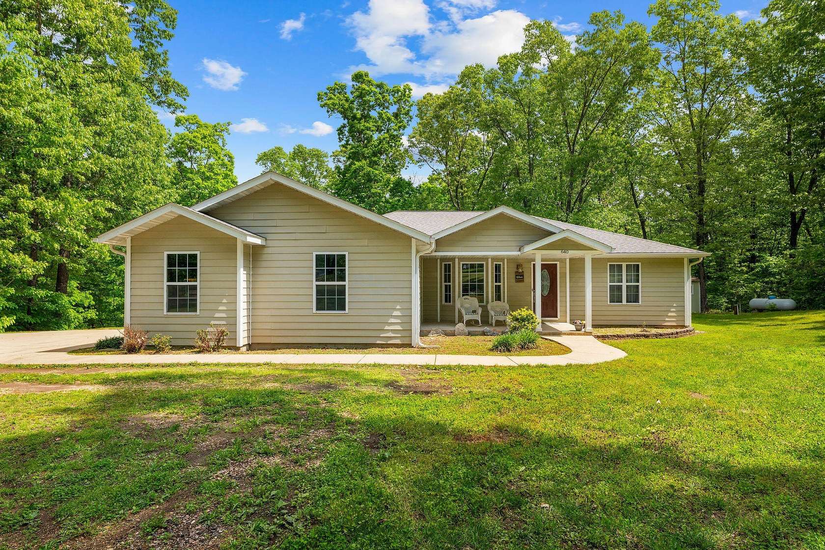 6.4 Acres of Land with Home for Sale in Reeds Spring, Missouri