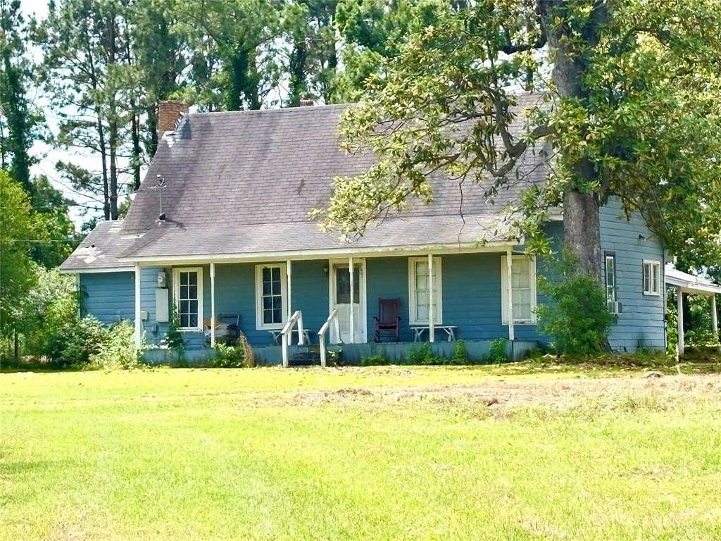 2.64 Acres of Land with Home for Sale in Leesburg, Texas