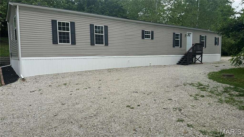 1.69 Acres of Land with Home for Sale in St. Clair, Missouri