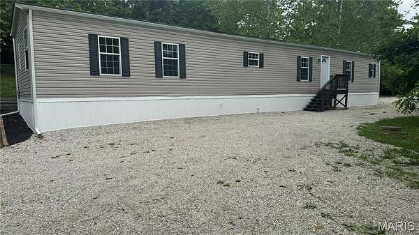 1.69 Acres of Land with Home for Sale in St. Clair, Missouri