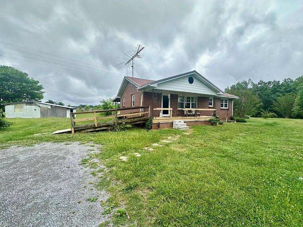 6.4 Acres of Land with Home for Sale in Moss, Tennessee