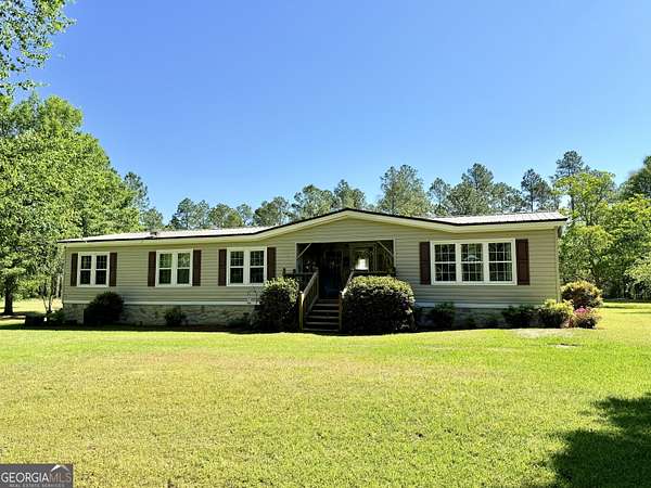 3 Acres of Land with Home for Sale in Enigma, Georgia