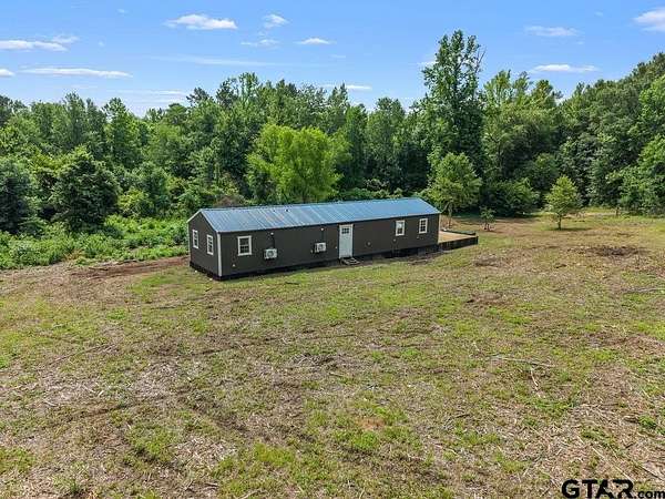 7 Acres of Land with Home for Sale in Gilmer, Texas
