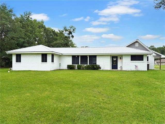 1.56 Acres of Land with Home for Sale in Lacombe, Louisiana