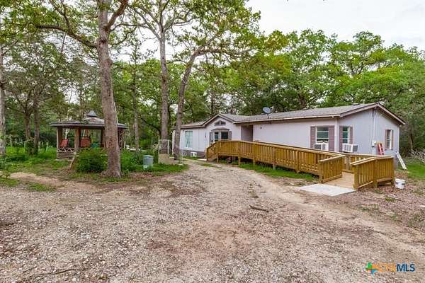 5.38 Acres of Land with Home for Sale in Bastrop, Texas