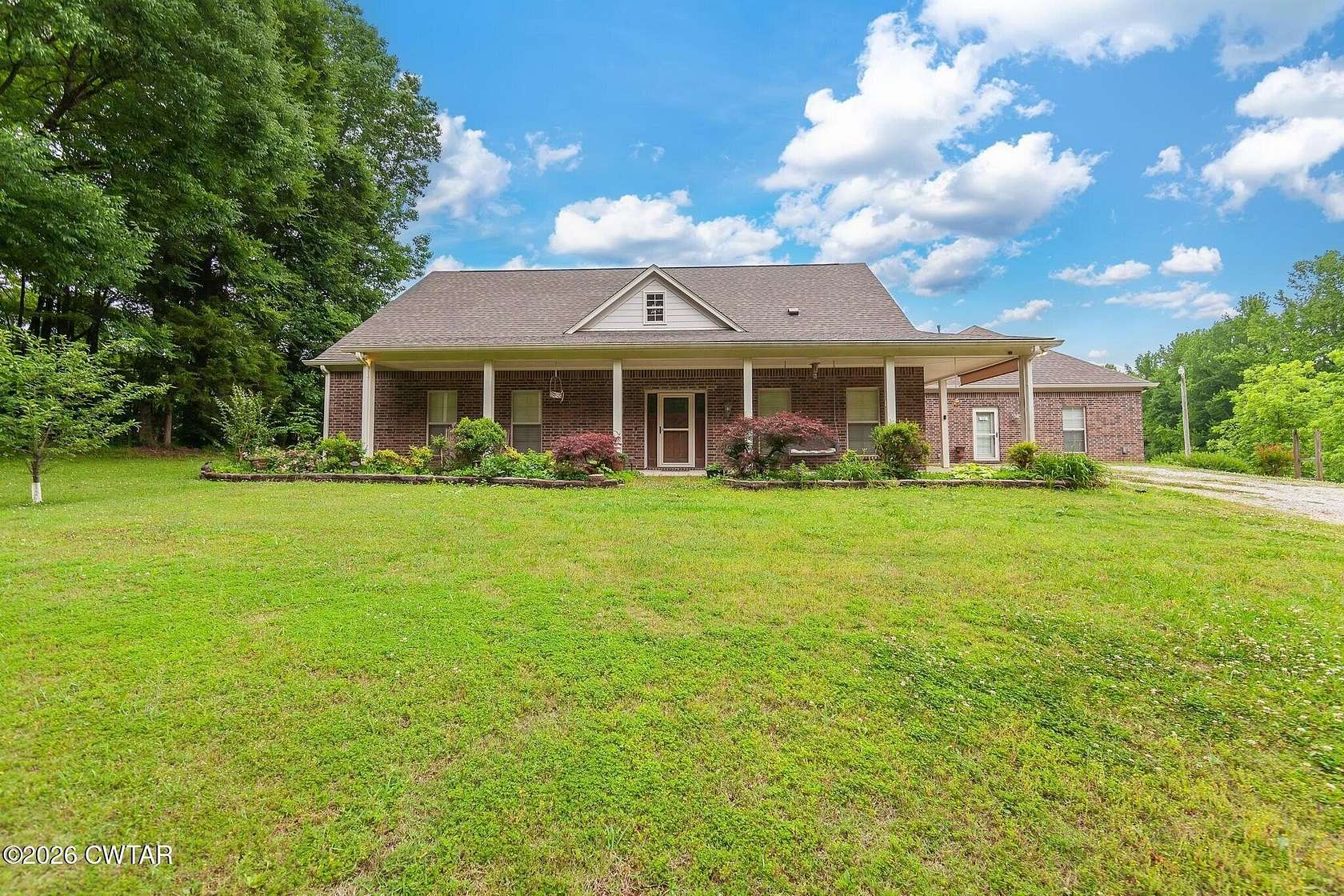 26 Acres of Land with Home for Sale in Beech Bluff, Tennessee