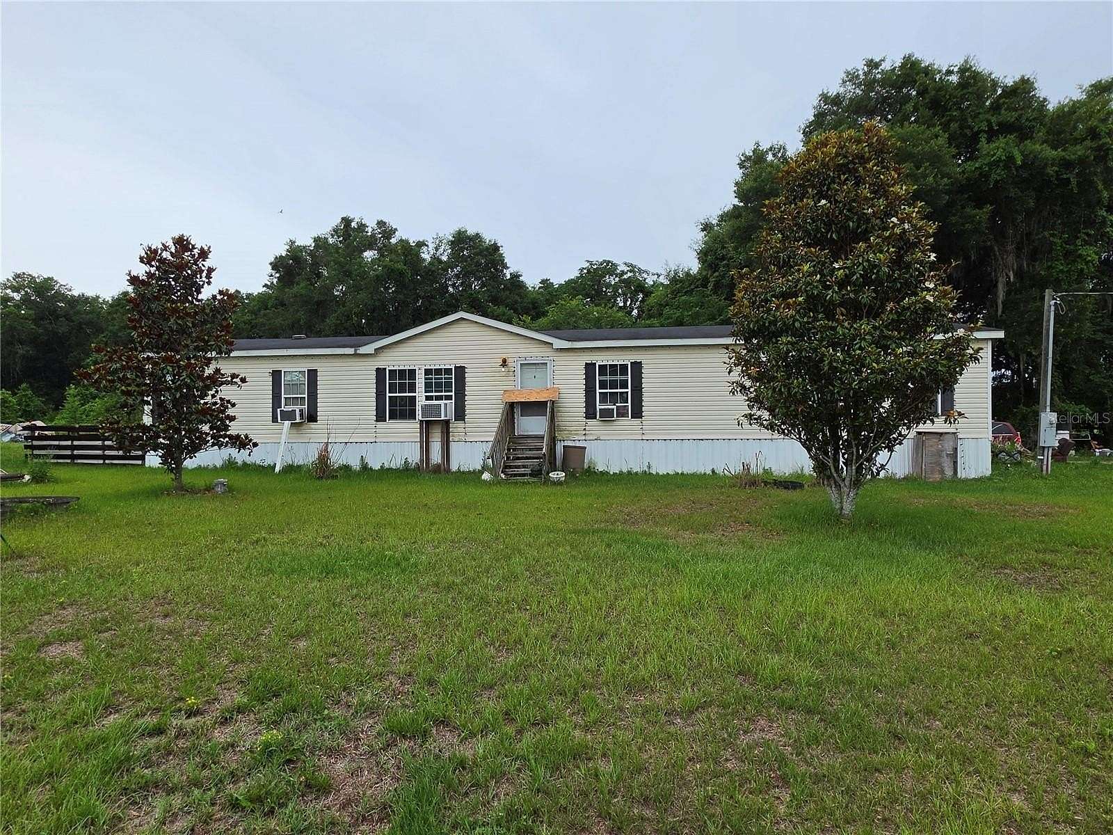 14.6 Acres of Land with Home for Sale in Citra, Florida