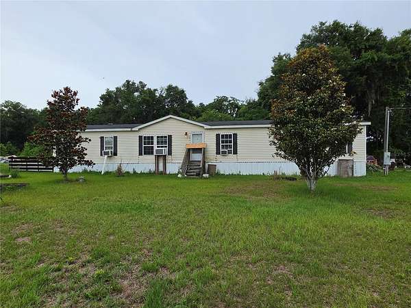 14.6 Acres of Land with Home for Sale in Citra, Florida