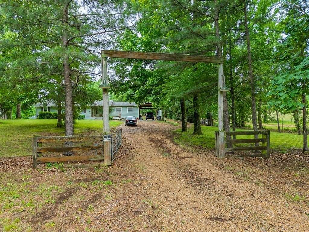 9.5 Acres of Land with Home for Sale in Coldwater, Mississippi